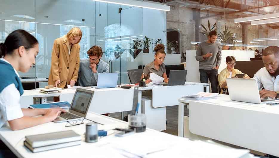 Busy day. Group of multiracial business people working together in the creative co-working space. Team building concept. Office life. Web banner