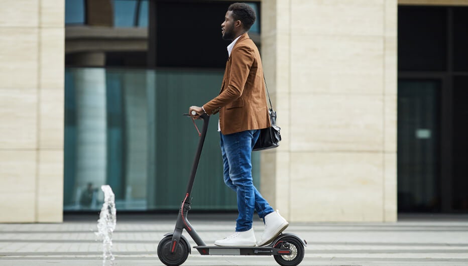 man-on-scooter